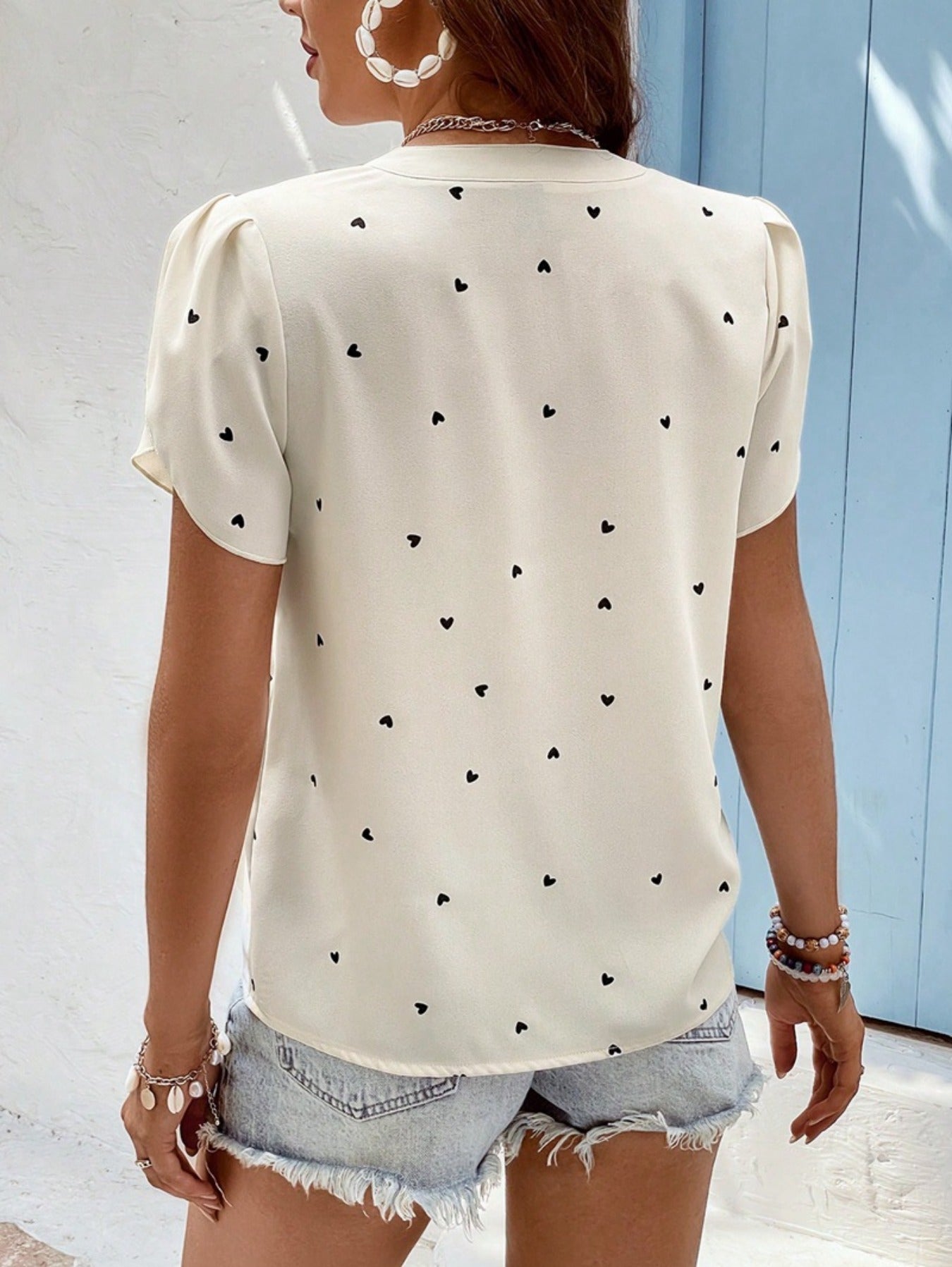 Short Sleeve Shirt With Heart Print And Petal Hem