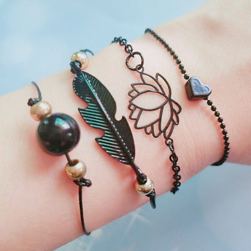 Black beaded lotus multi-piece set bracelet